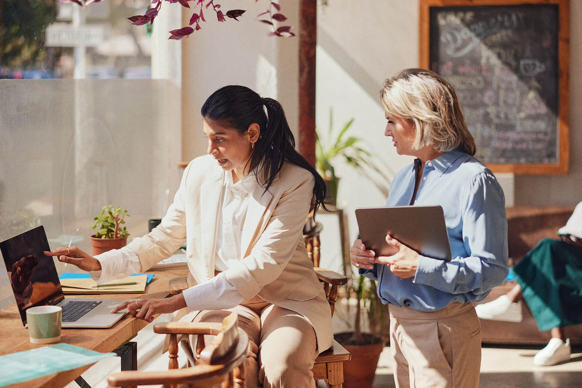 Sage HR Software Two Woman on Laptop