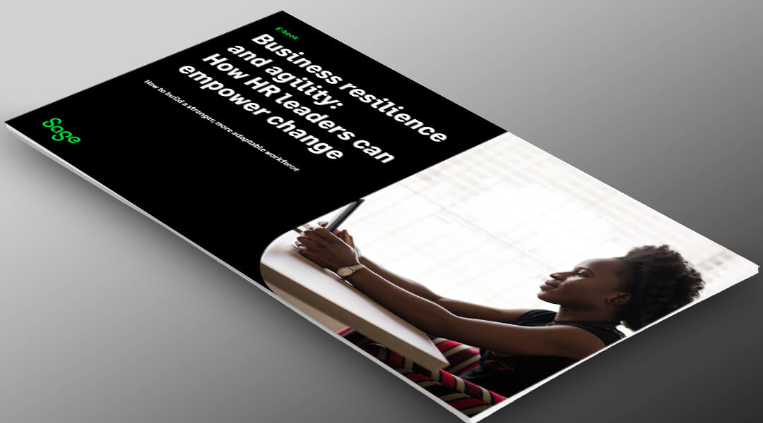 Business resilience and agility: How HR leaders can empower change cover photo of woman working on a tablet at a table