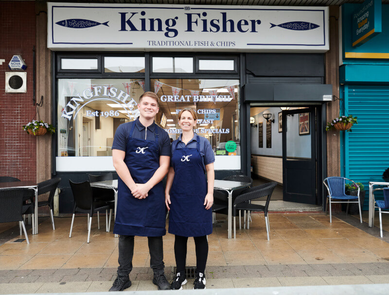 Two people standing outside their small business, Kingfisher - small business, EFL/Sage partnership