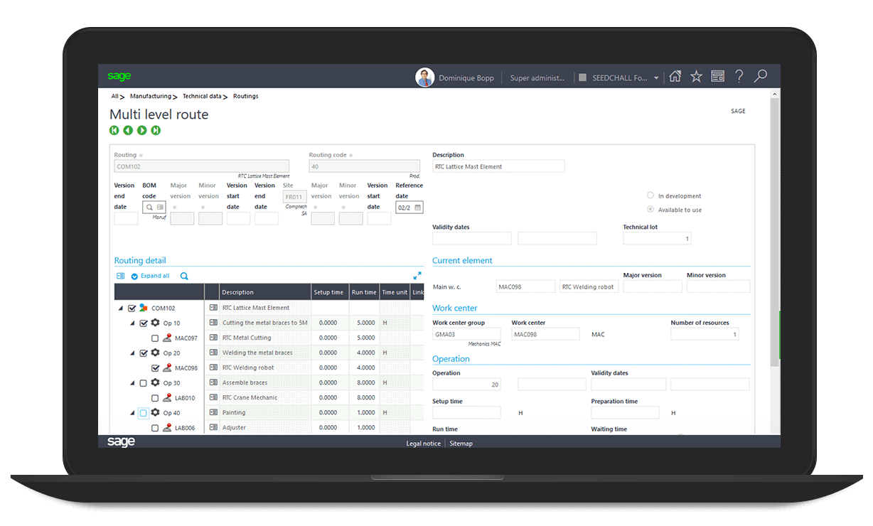 Laptop with Sage Enterprise Management routing process on screen