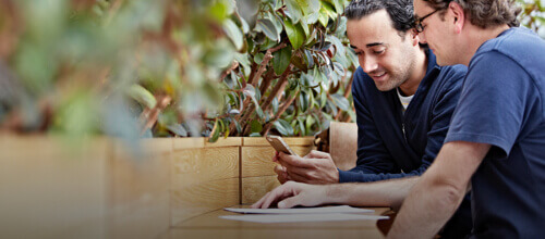 Employees chatting in open area