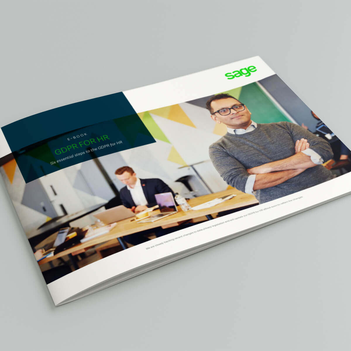 The HR and People leaders' guide to GDPR ebook cover photo of man standing and smiling in open office environment