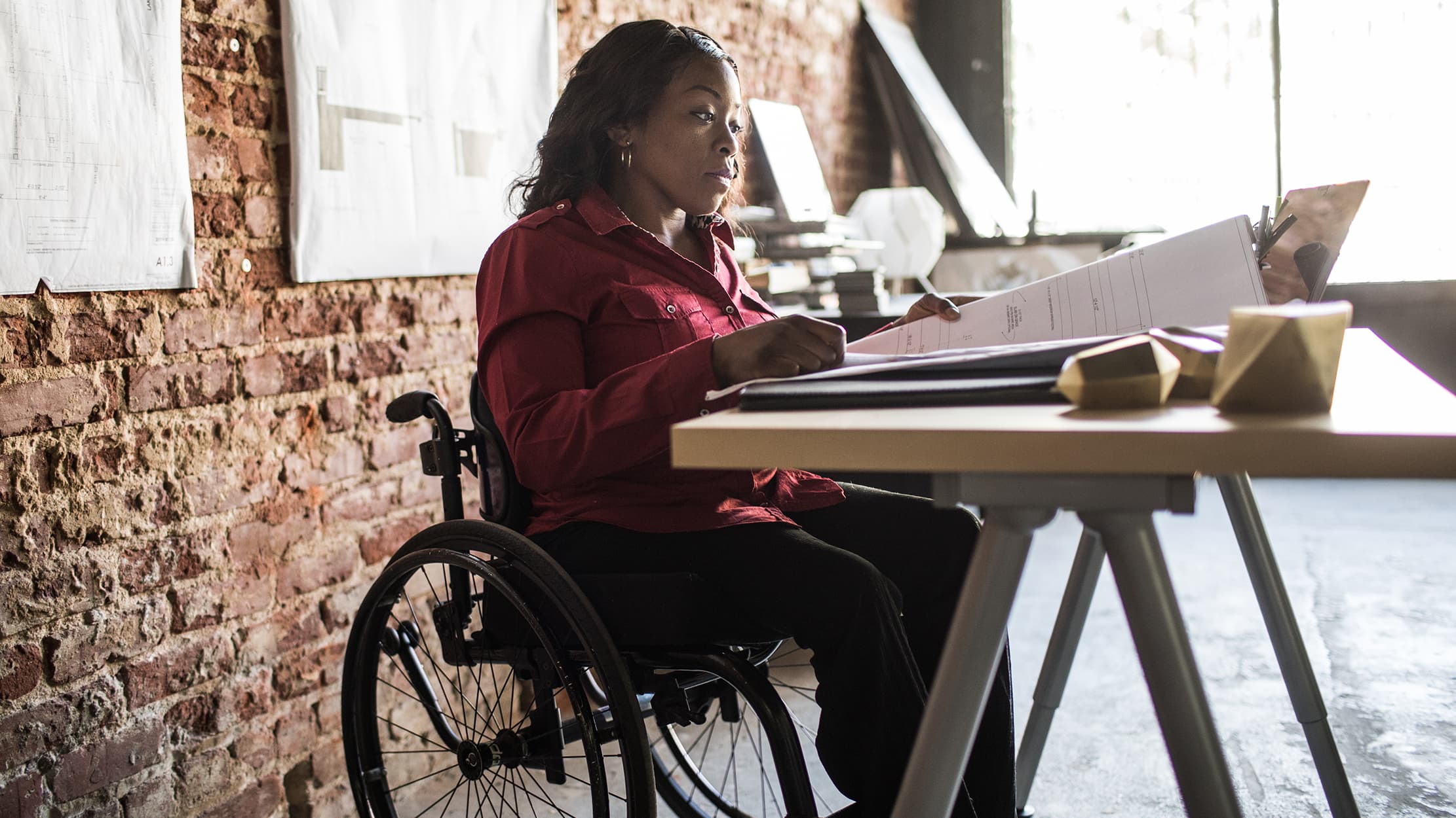 Crippled woman working as secretary