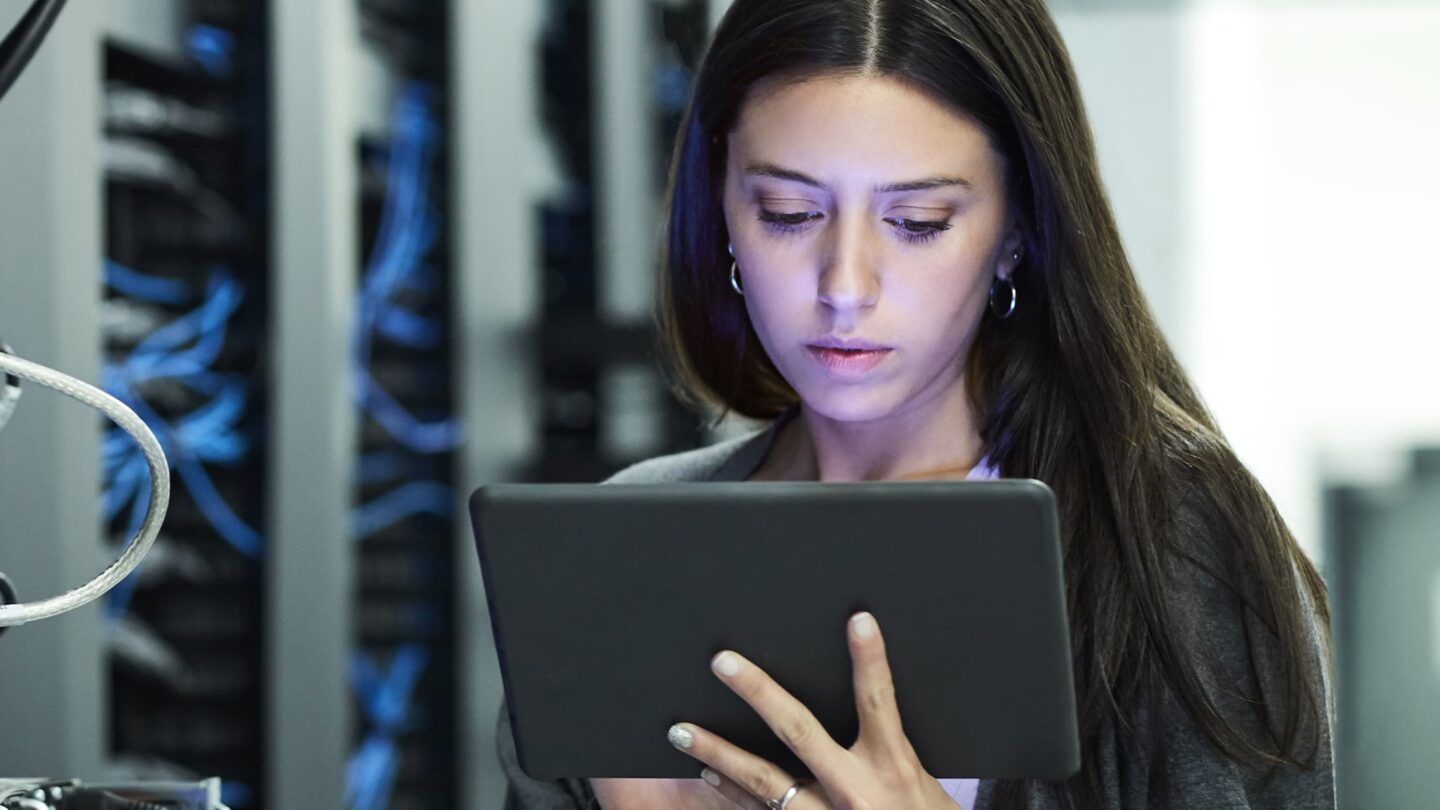 Woman operating tab