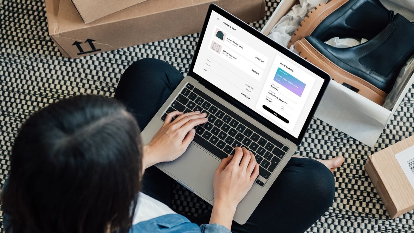 Female hands working on a laptop