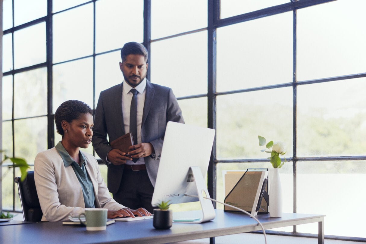 Professionals talking in an office