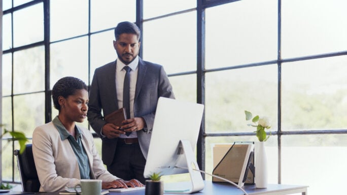 Professionals talking in an office